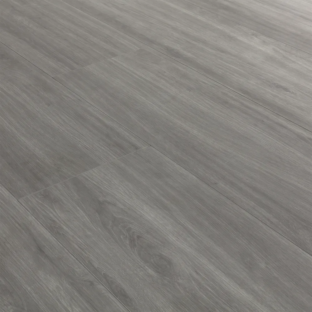 Closeup view of a floor with Summit Gray vinyl flooring installed